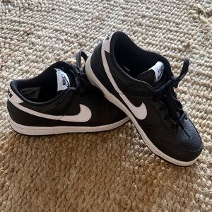 Nike Dunk Low Retro Black Panda 2.0 black leather with white accents